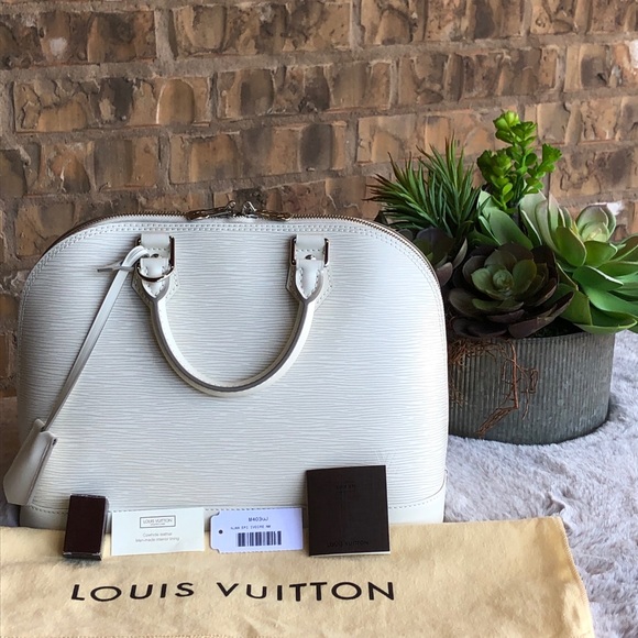 Louis Vuitton Handbags - “New” Louis Vuitton Alma Epi Bag in Ivory.
